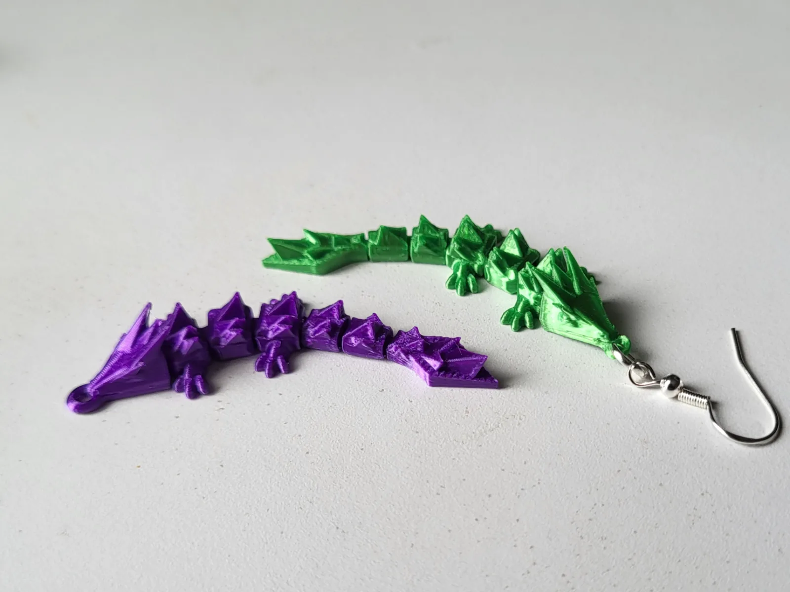 Aretes de dragón flexible