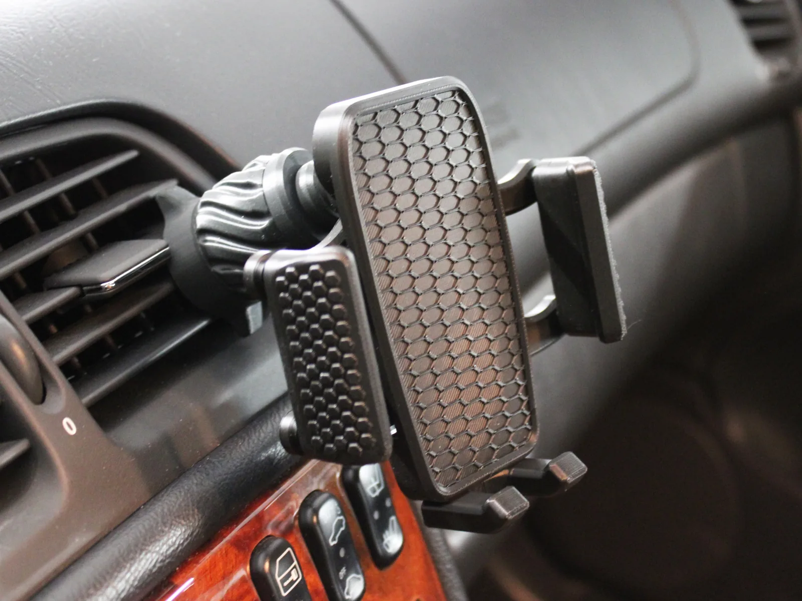 Soporte de celular con rótula para rejilla