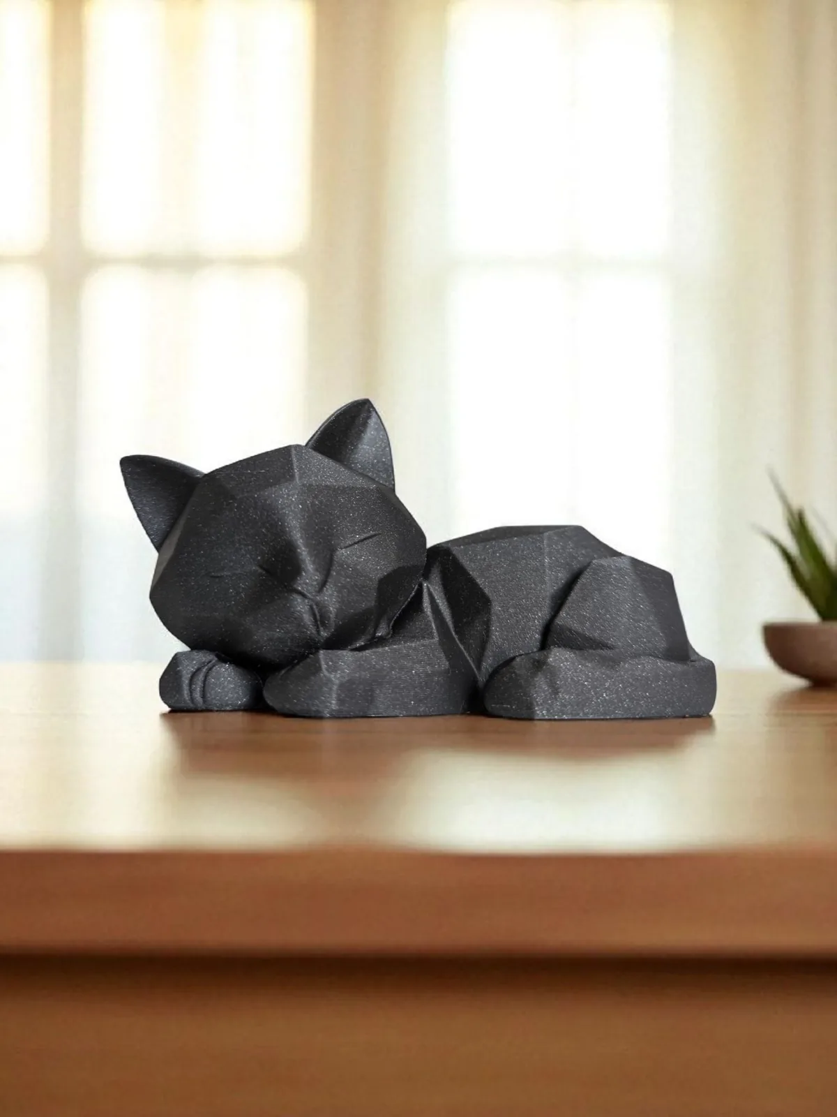 Gatinho dormindo low poly impresso em 3D, foto 3