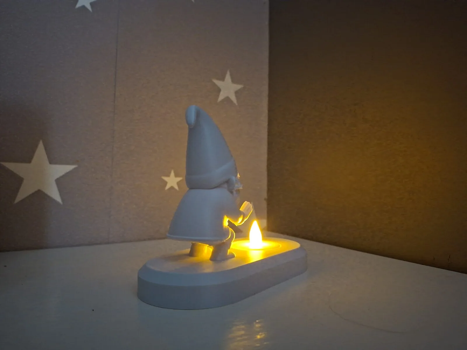 3D printed Gnome warming himself by the LED tealight, photo 4