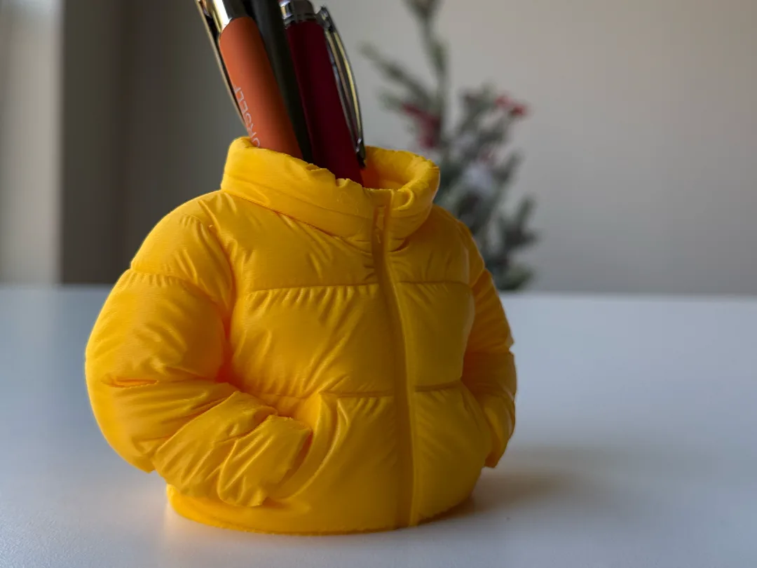 Lapicero chaqueta acolchada