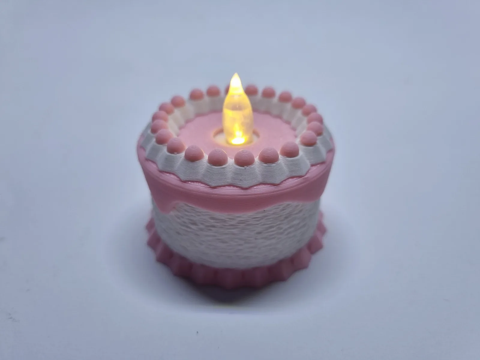 Torta decorativa con vela LED