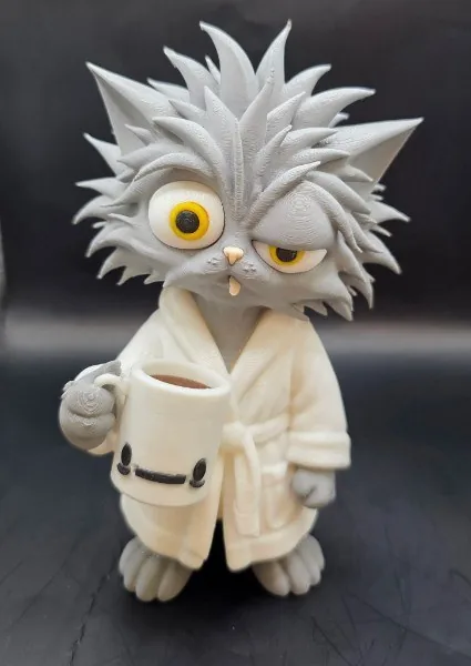 Gato mañanero con taza