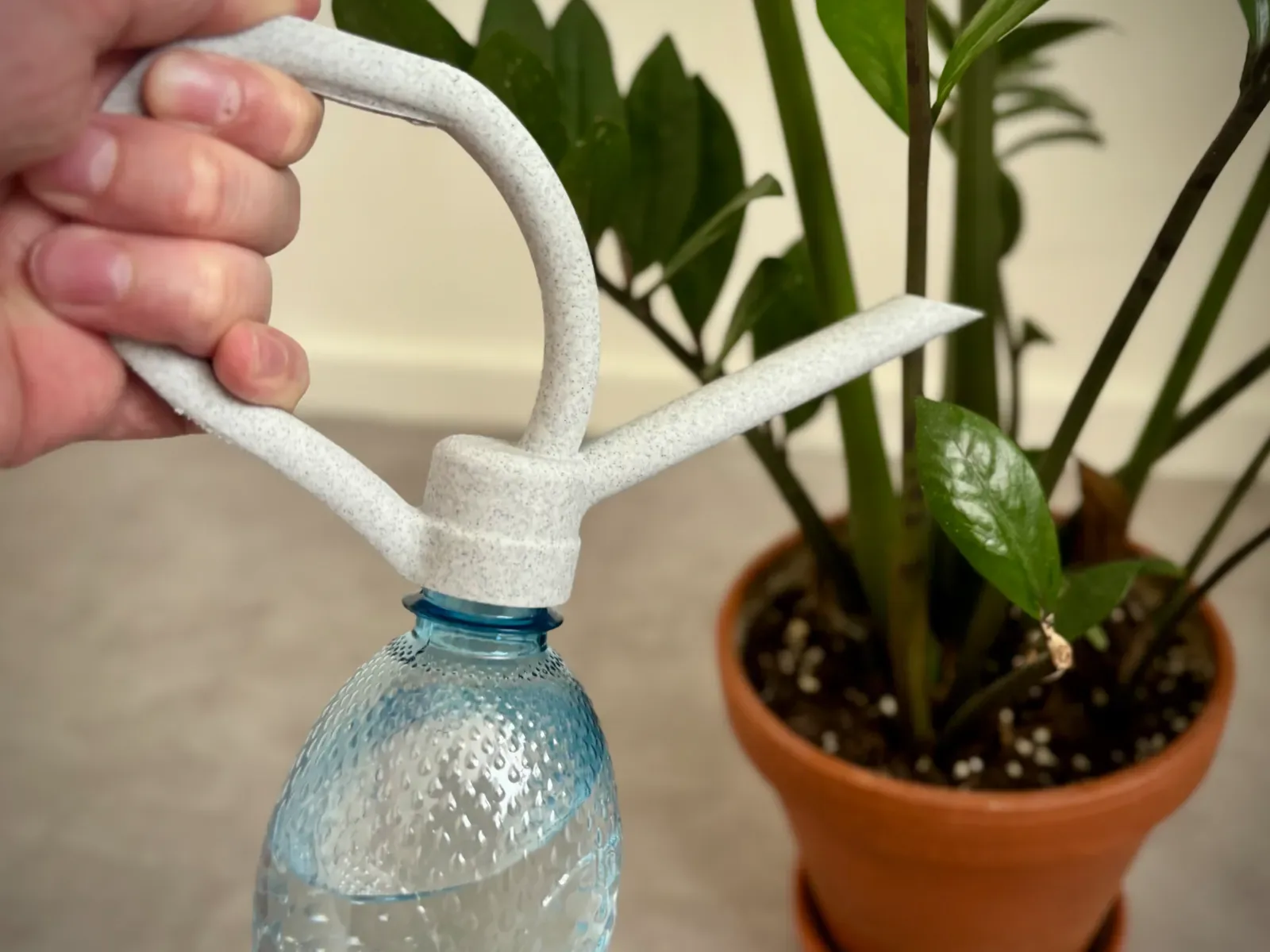 Tapa regadera para botella
