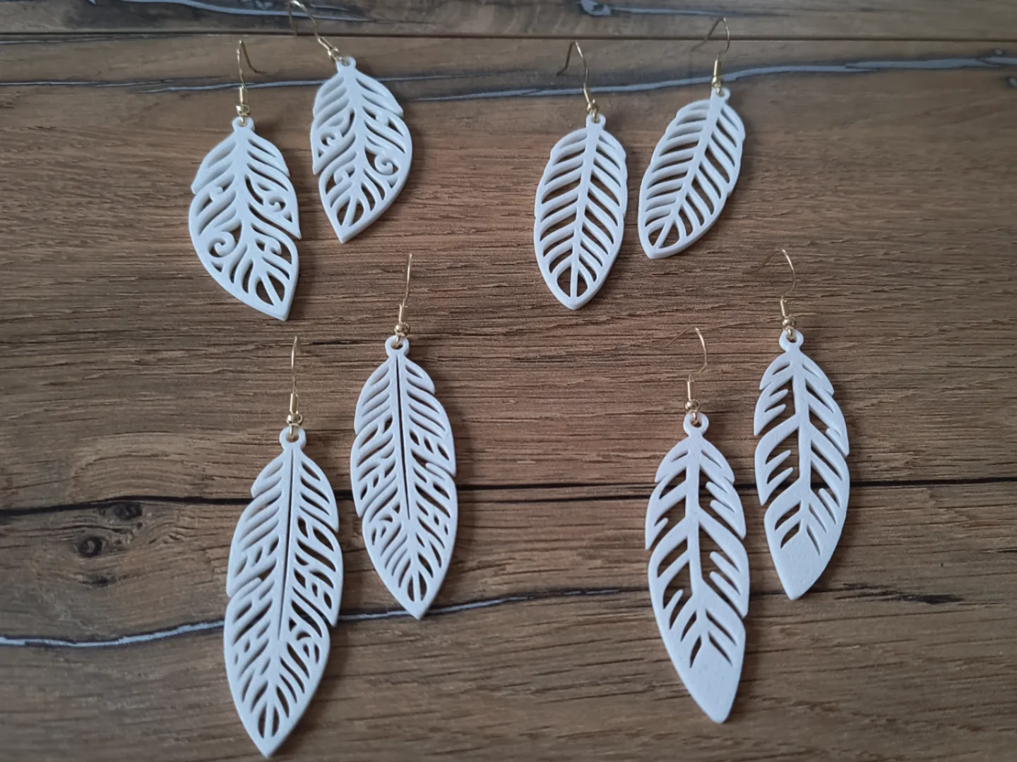 Aretes de plumas (4 diseños)