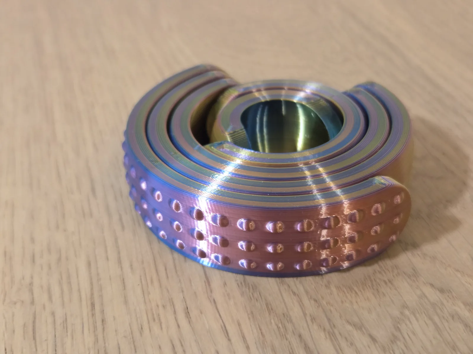 Arcspin fidget giratorio