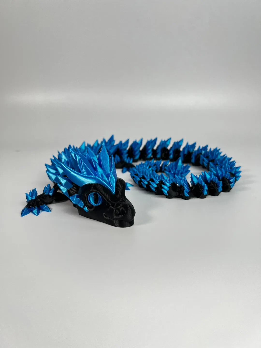 Dragón de cristal articulado