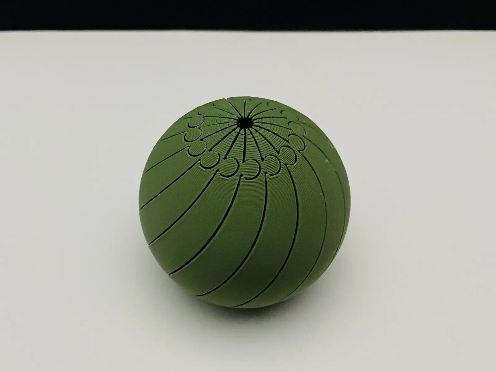 Pelota fidget giratoria