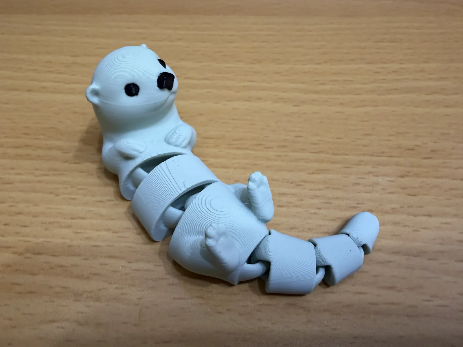 Chaveiro lontra articulada impresso em 3D, foto 3
