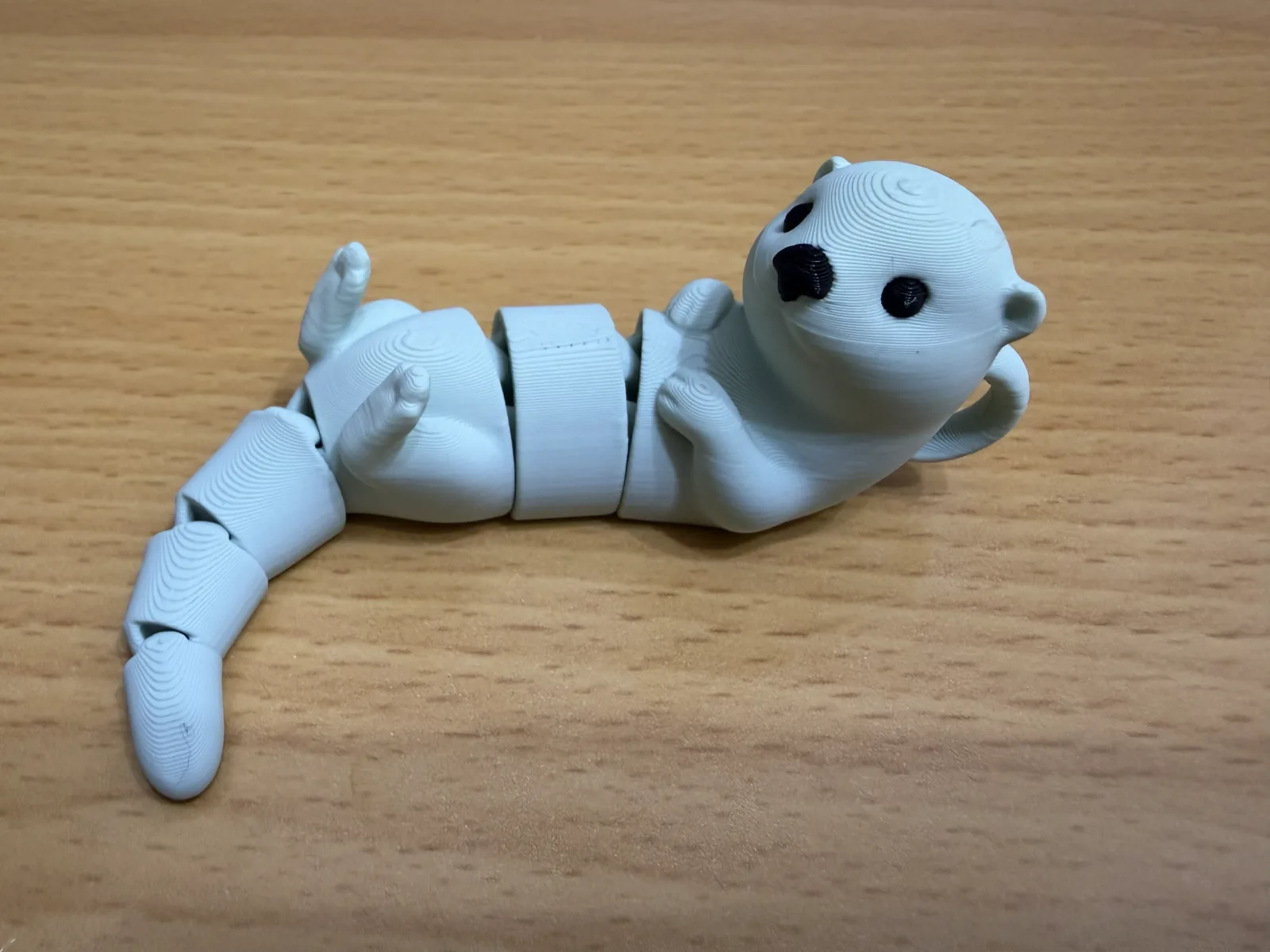 Chaveiro lontra articulada impresso em 3D, foto 4
