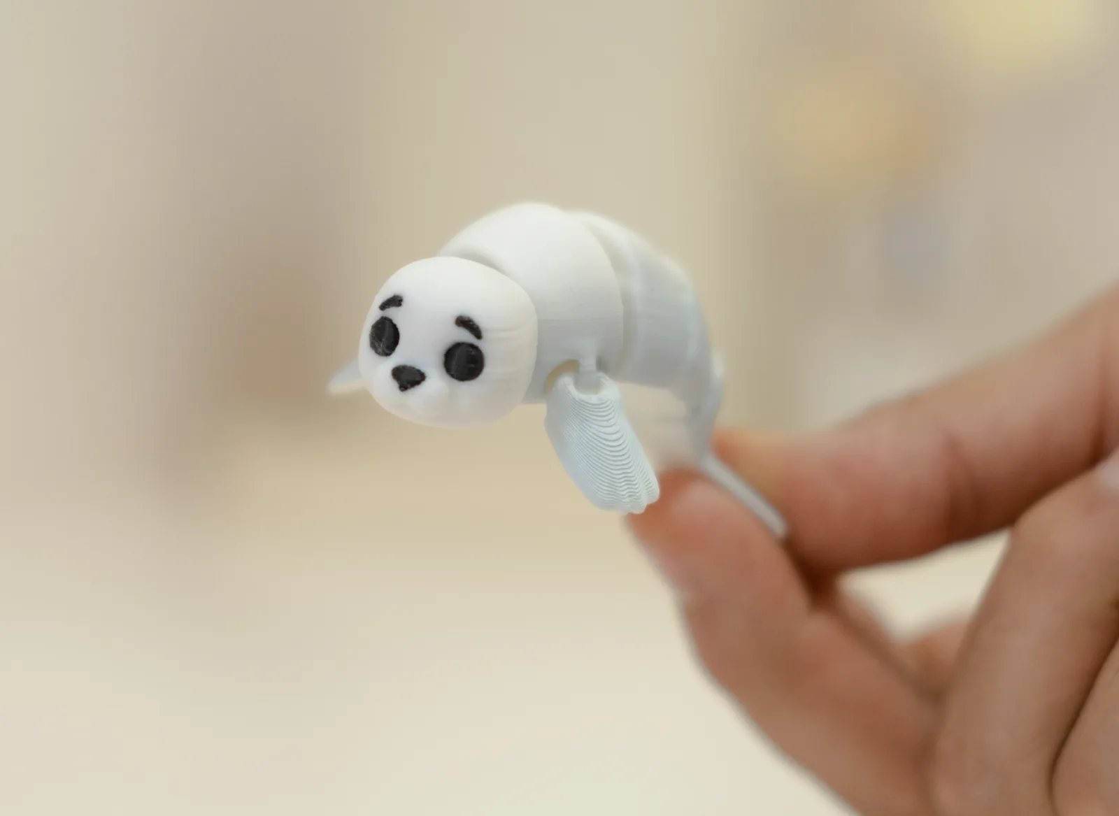 Llavero foca articulada impreso en 3D