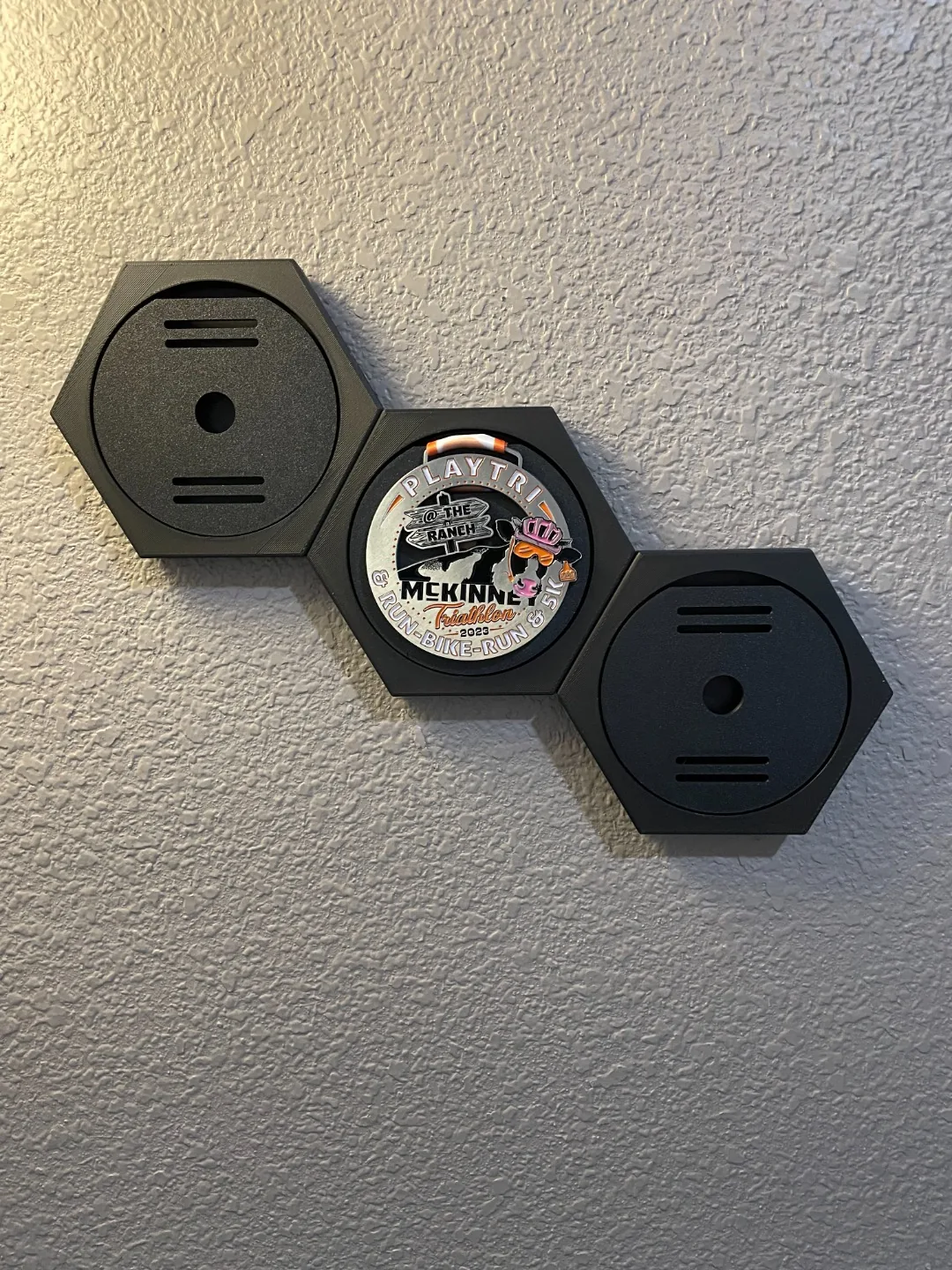 Honeycomb hexagon medal display