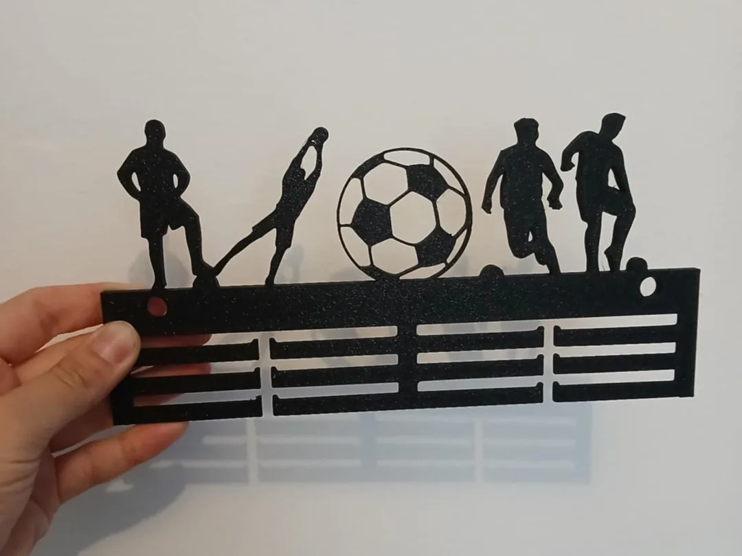 Medallero de fútbol con jugadores