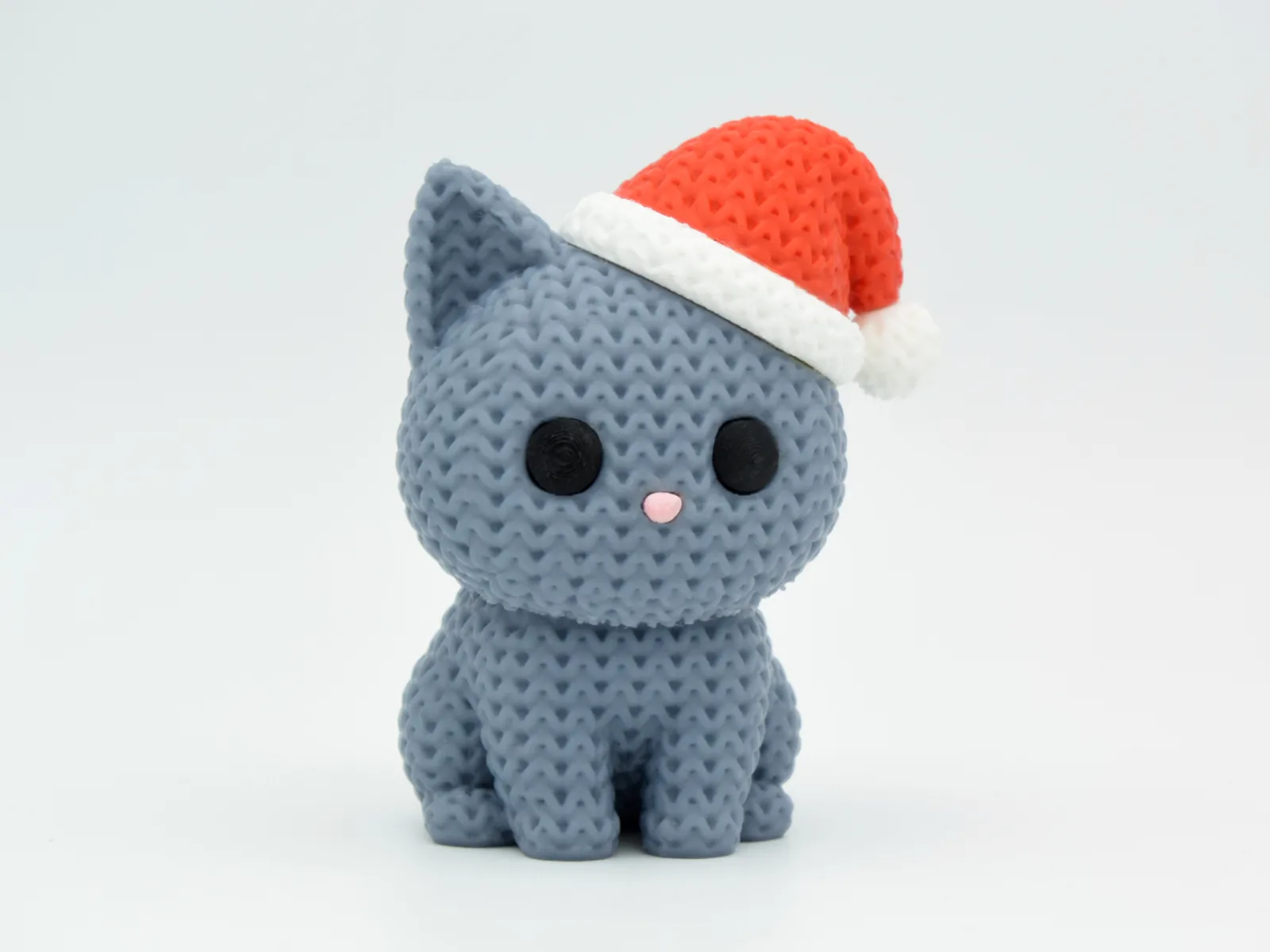 Knitted cat with Santa hat