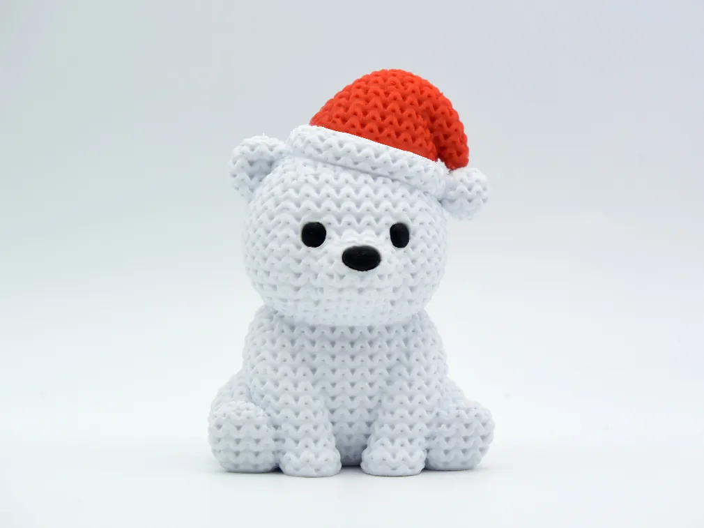 Oso polar tejido con gorro navideño