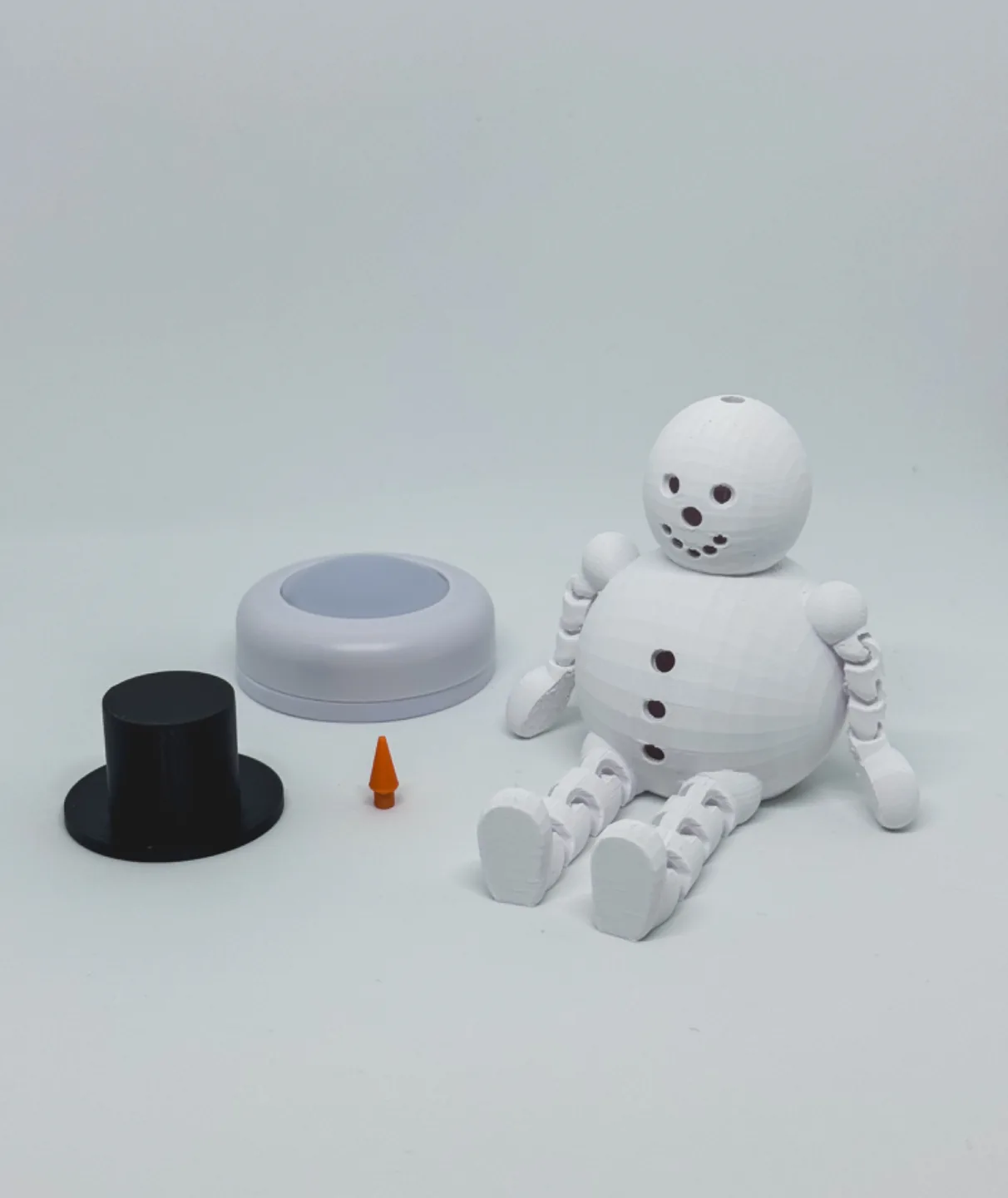 Boneco de neve articulado sentado impresso em 3D, foto 4