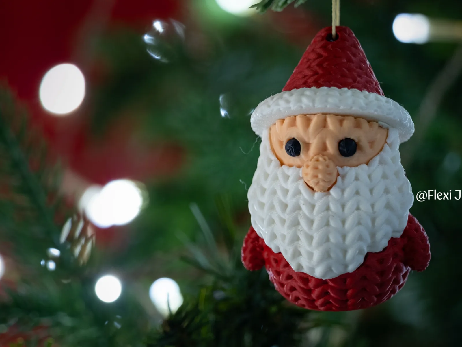 Hanging knitted Santa Claus ornament