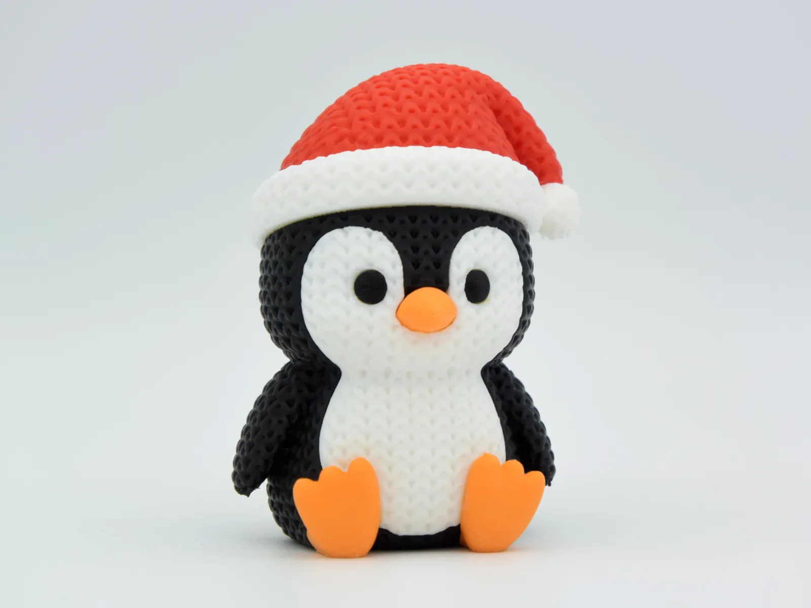 Pingüino tejido con gorro de Papá Noel