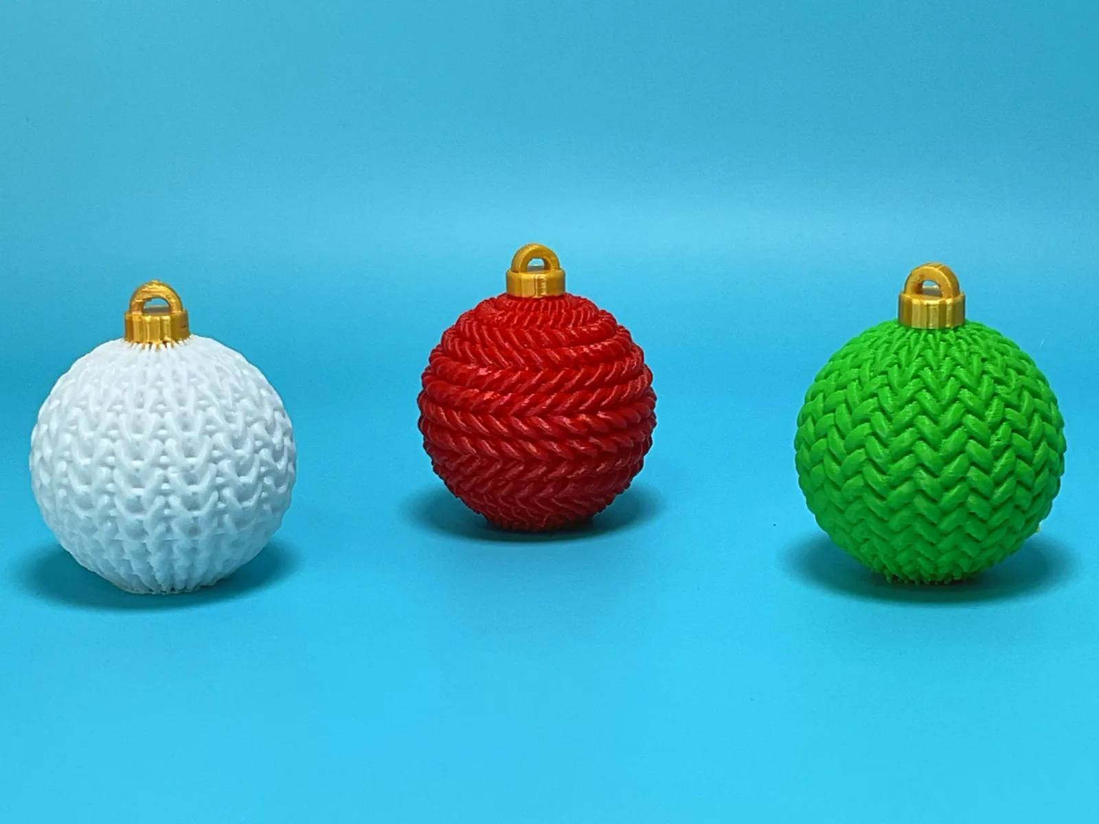 Set de 3 bolas navideñas con textura tejida