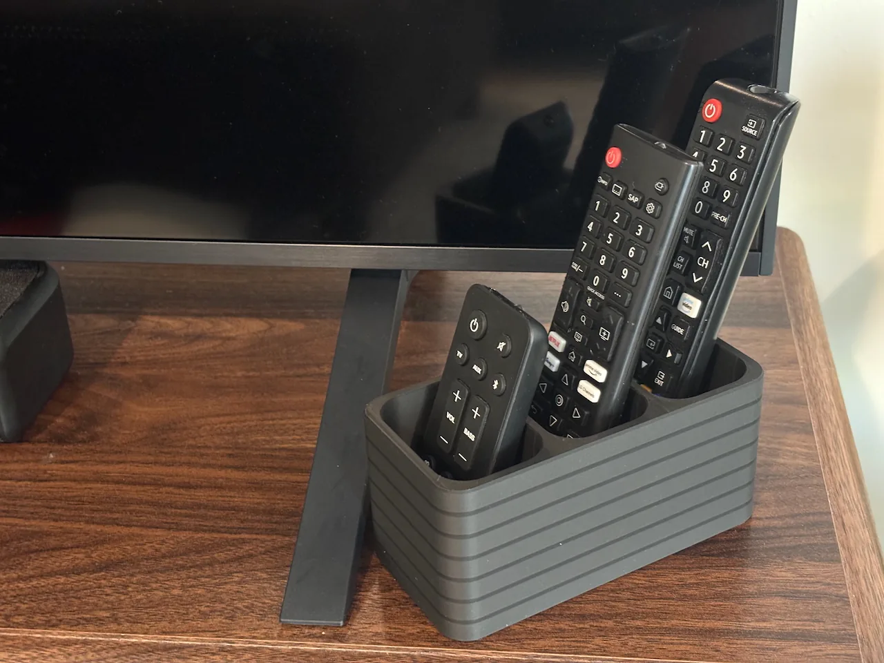 Porta controles remotos impreso en 3D, foto 3