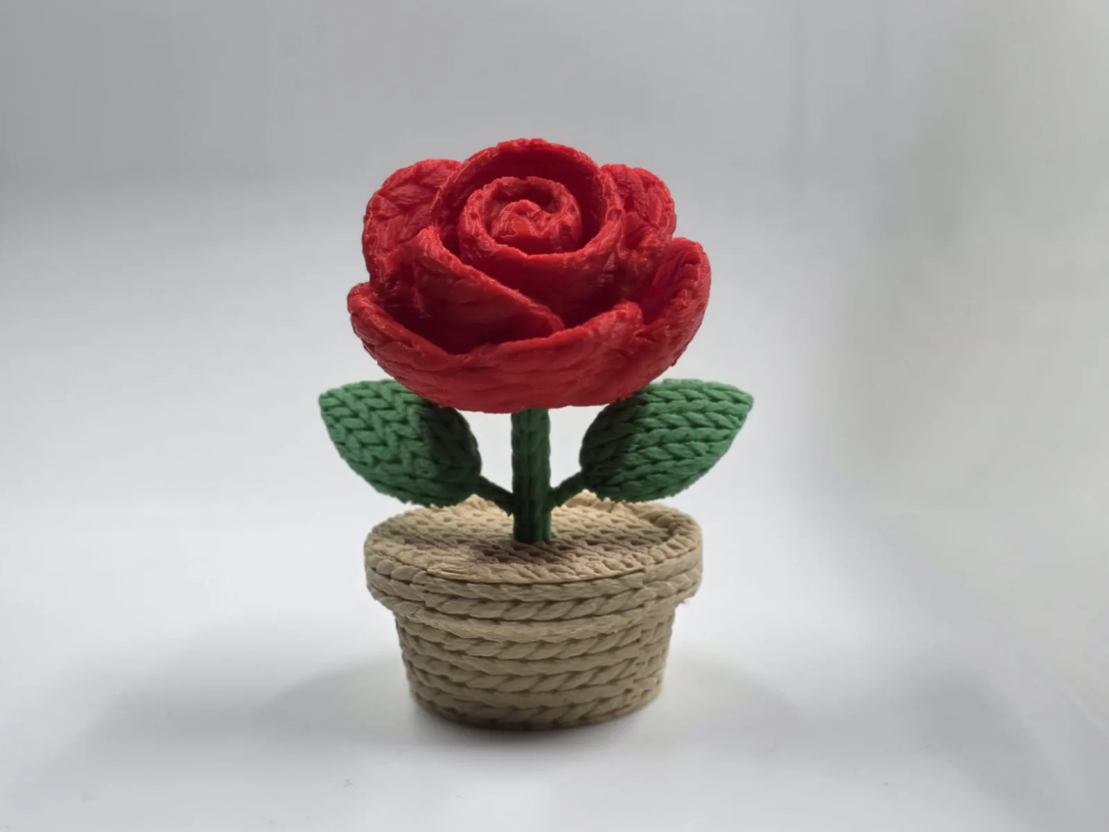 Rosa tejida en matera impreso en 3D